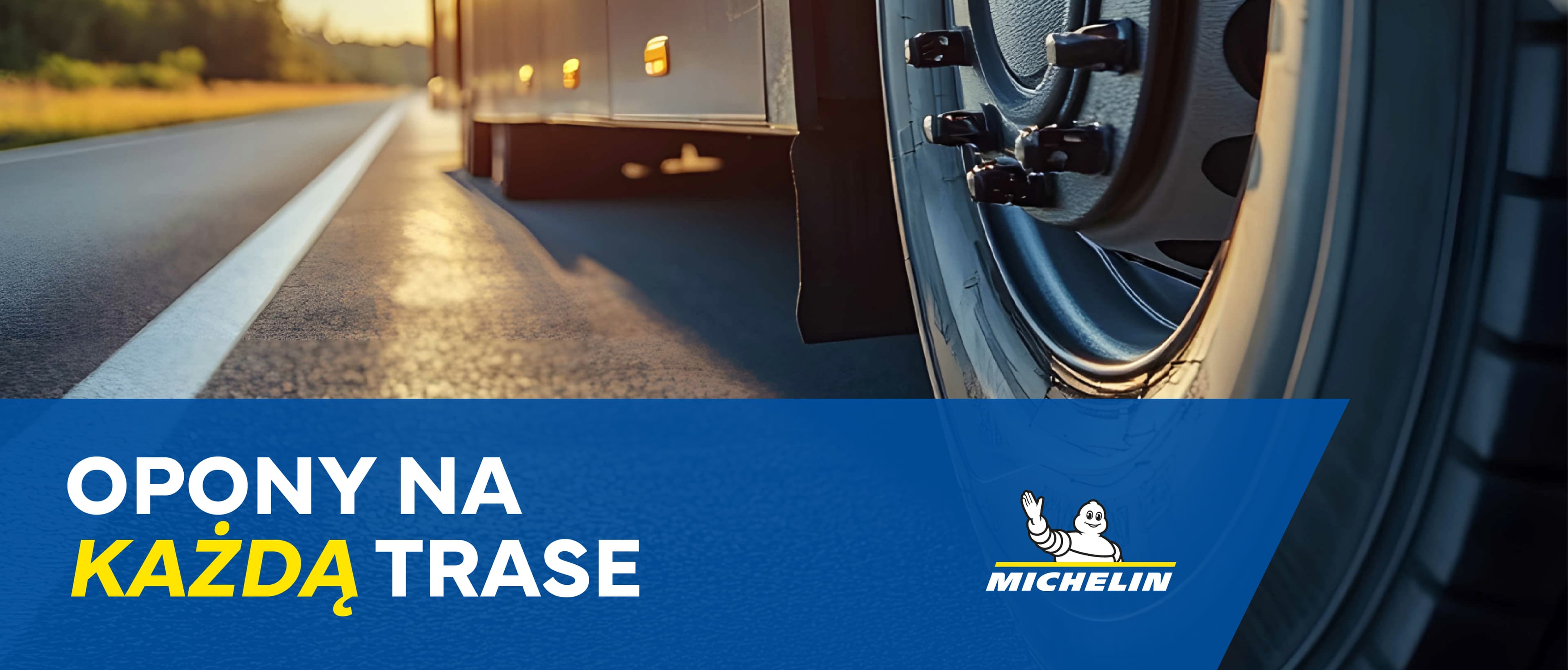 Zbliżenie na koło ciężarówki Michelin na drodze – baner "Opony na każdą trasę" z logo Michelin.